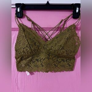 Olive green bralette with adjustable cross straps and elastic around back!  XS